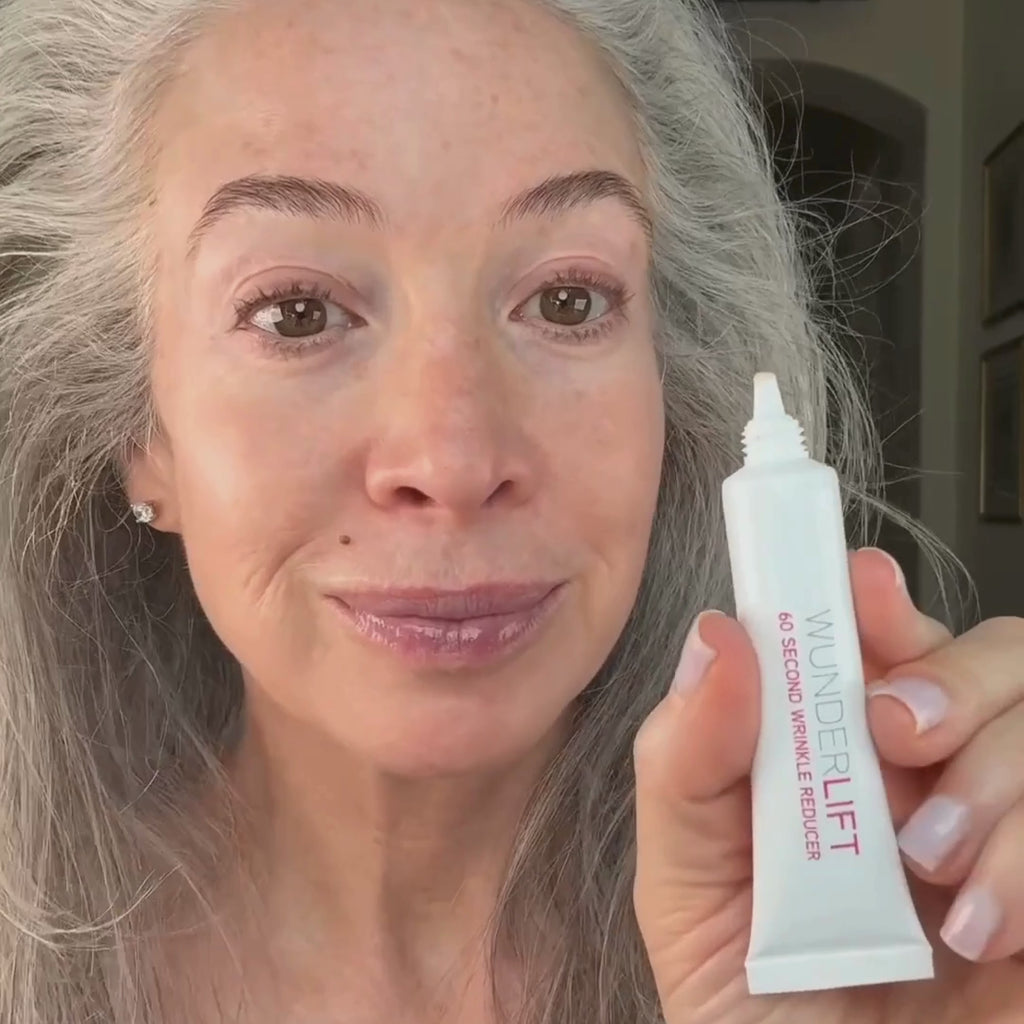 Woman showing how to apply wunderlift 60 second wrinkle reducer under eye serum